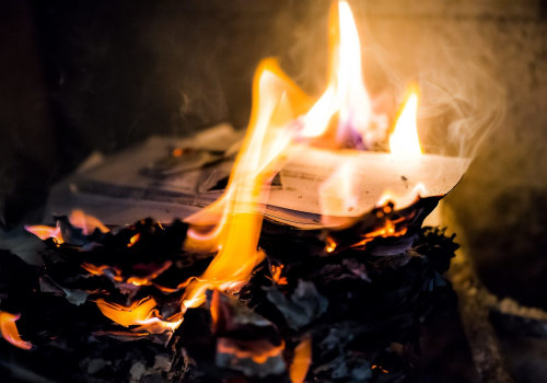 Is it ok to burn paper in a wood burner?